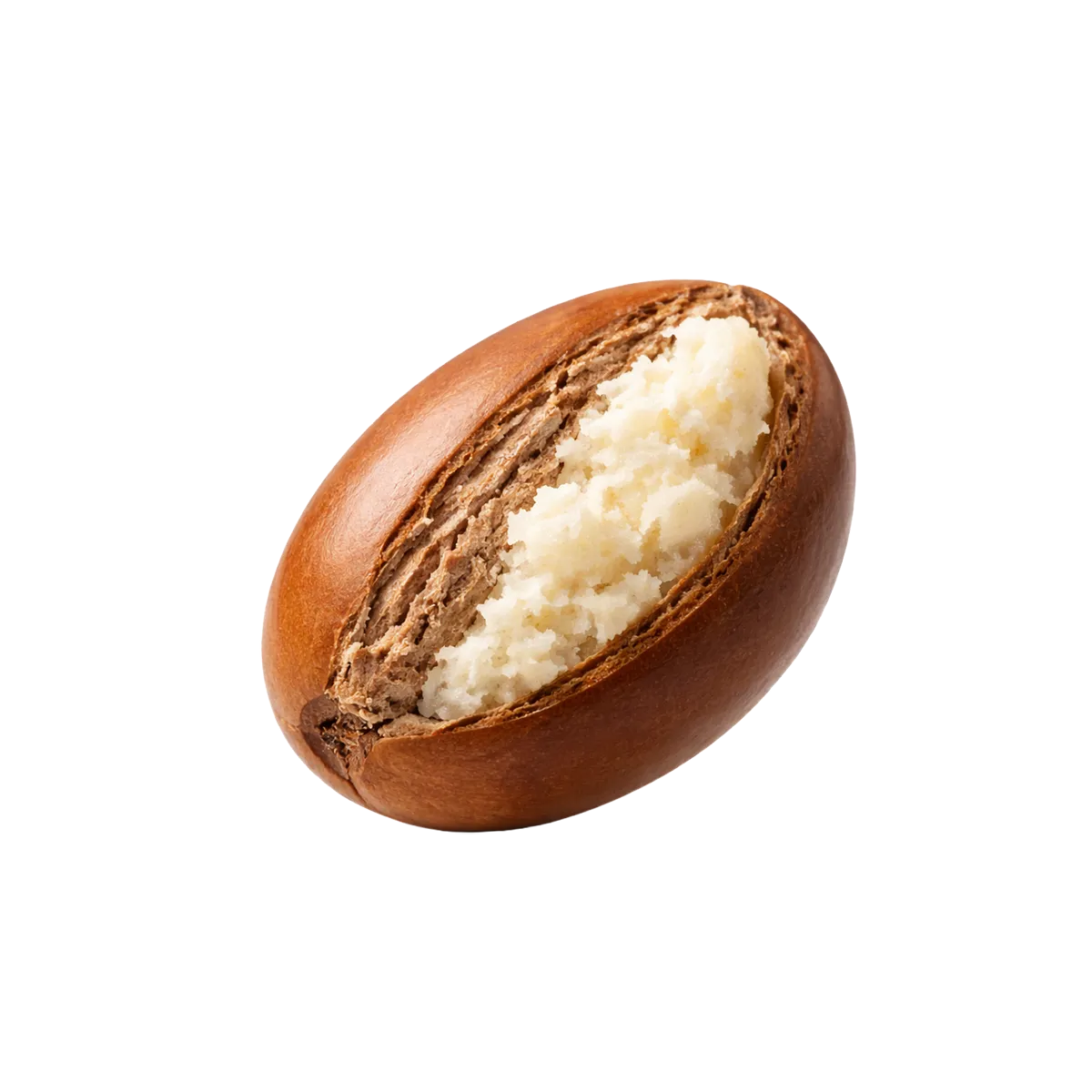 Shea nut with a white butter on a white background