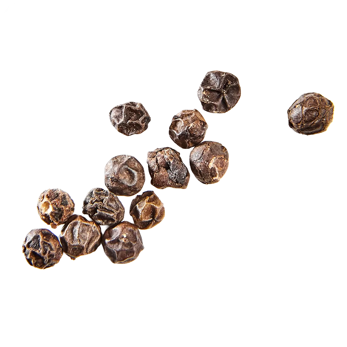 Black peppercorns on a white background