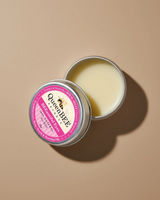 Queen Bee Secrets BEE-autiful Eyes tin on a beige background